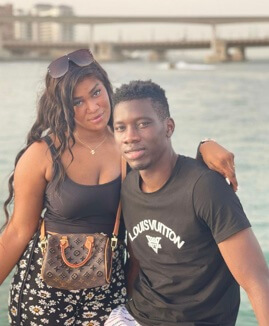 Ismaila Sarr with his wife.